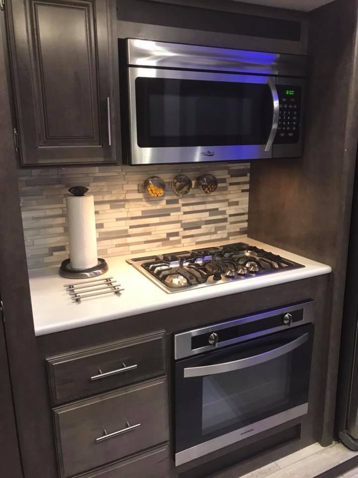 For most tiny RV kitchens, the backsplash becomes the focal point