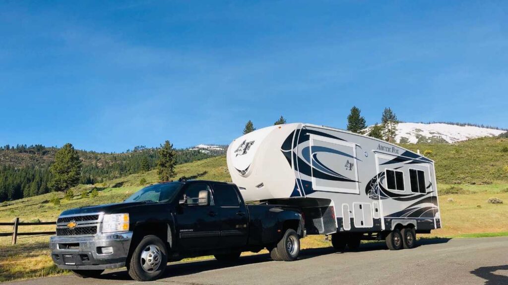 Fifth Wheel camper in front of the mountains