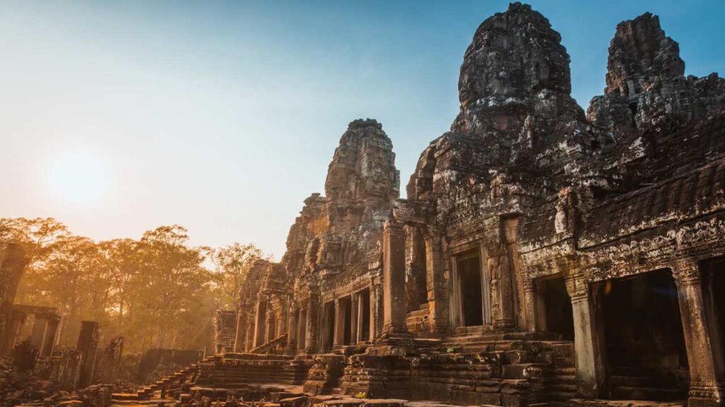 Sunset at the Bayon Temple in Angkor Thom, Cambodia.